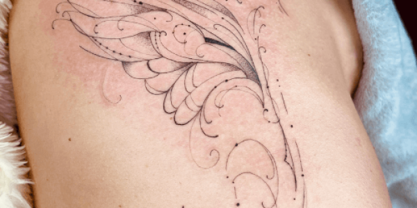 Tatuagem Fênix Costela