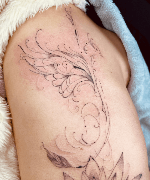 Tatuagem Fênix Costela